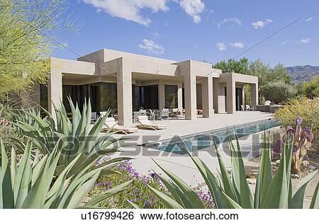 Stock Photograph - Small pool in patio of manor house. Fotosearch