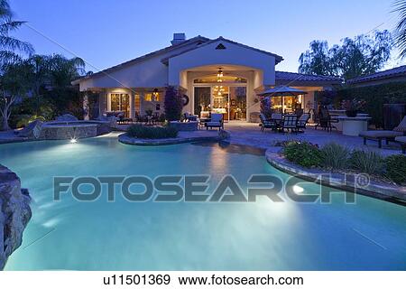Swimming pool in manor house in evening View Large Photo Image Stock Photo - Swimming pool in manor house in evening. Fotosearch