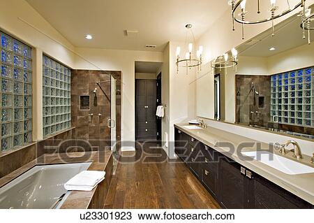 Stock Image - View of modern bathroom in luxury villa. Fotosearch