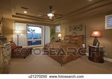 Stock Image - Bedroom interior of mansion. Fotosearch