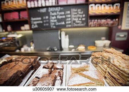 Close-up view of freshly made pastries in bakery View Large Photo Image Stock Photo - Close-up view of freshly made pastries in bakery. Fotosearch