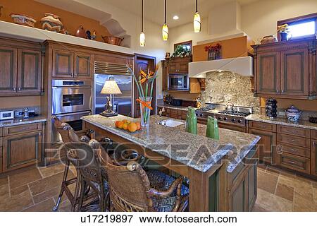 Contemporary kitchen interior of luxury mansion View Large Photo Image Stock Photo - Contemporary kitchen interior of luxury mansion. Fotosearch