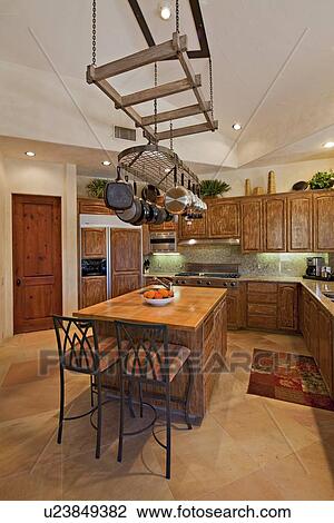 Contemporary kitchen with chairs in luxury villa View Large Photo Image Stock Image - Contemporary kitchen with chairs in luxury villa. Fotosearch