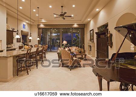 Contemporary mansion with living room and kitchen together View Large Photo Image Stock Photo - Contemporary mansion with living room and kitchen together. Fotosearch