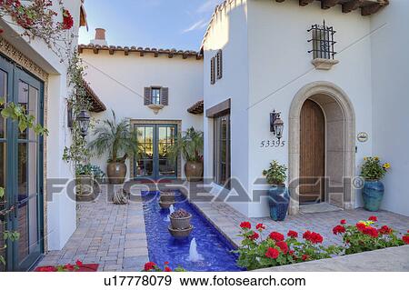 Fountain in front courtyard of luxury manor house View Large Photo Image Stock Photo - Fountain in front courtyard of luxury manor house. Fotosearch