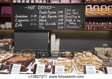 Fresh baked goods displayed in bakery View Large Photo Image Stock Image - Fresh baked goods displayed in bakery. Fotosearch