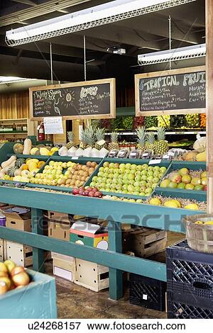Fresh fruits stall in supermarket View Large Photo Image Stock Photo - Fresh fruits stall in supermarket. Fotosearch