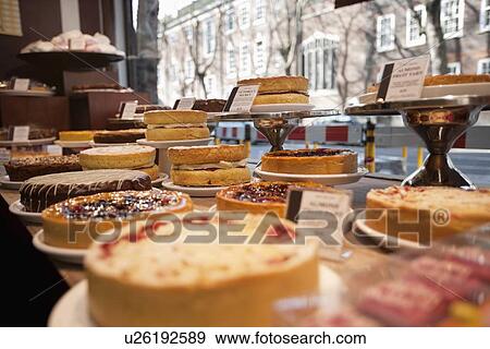 Fresh pastries displayed in bakery store View Large Photo Image Stock Photo - Fresh pastries displayed in bakery store. Fotosearch