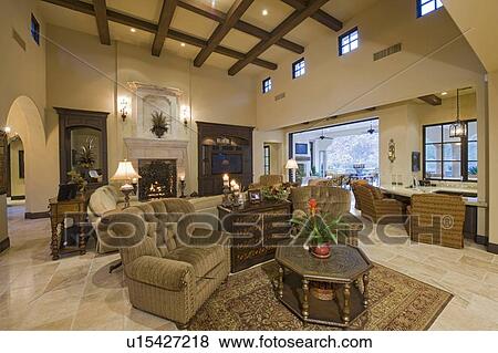Stock Photo - Lavish living room of luxury mansion. Fotosearch