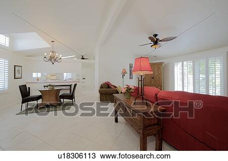 Stock Image - Modern living room interior with dining table and chair. Fotosearch