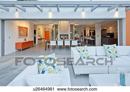 Outdoor seating furniture in patio of luxury mansion View Large Photo Image Stock Image - Outdoor seating furniture in patio of luxury mansion. Fotosearch