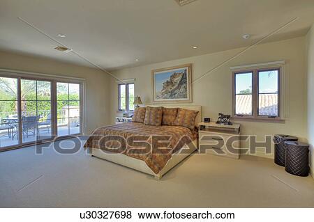 Stock Photo - Spacious bedroom in luxury manor house. Fotosearch