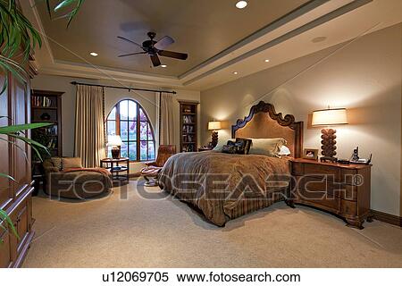 Spacious bedroom in luxury manor house View Large Photo Image Stock Photography - Spacious bedroom in luxury manor house. Fotosearch