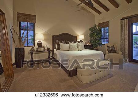 Stock Photograph - Stylish modern bedroom interior design. Fotosearch
