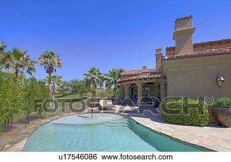Swimming pool outside luxury villa View Large Photo Image Stock Photograph - Swimming pool outside luxury villa. Fotosearch
