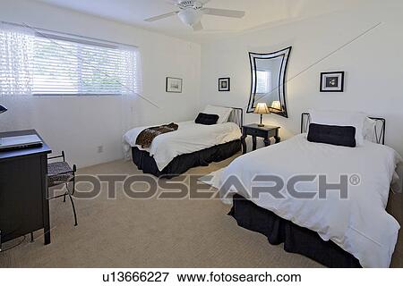 Stock Photo - Twin beds in luxury mansion. Fotosearch