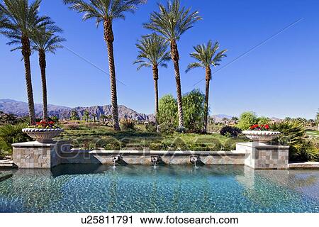 View of landscape from swimming pool of luxury mansion View Large Photo Image Stock Image - View of landscape from swimming pool of luxury mansion. Fotosearch