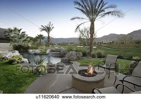 View of landscape with mountains in background from villa View Large Photo Image Stock Image - View of landscape with mountains in background from villa. Fotosearch
