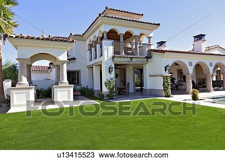 Stock Image - View of luxury mansion. Fotosearch