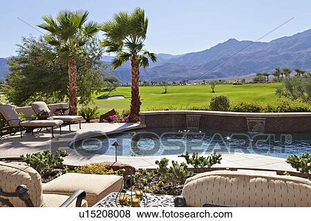 View of mountains with swimming pool in foreground View Large Photo Image Stock Photo - View of mountains with swimming pool in foreground. Fotosearch