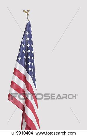 Picture - American flag over gray background. Fotosearch