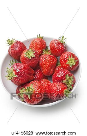 Stock Photo - Bowl full of strawberries against white background. Fotosearch