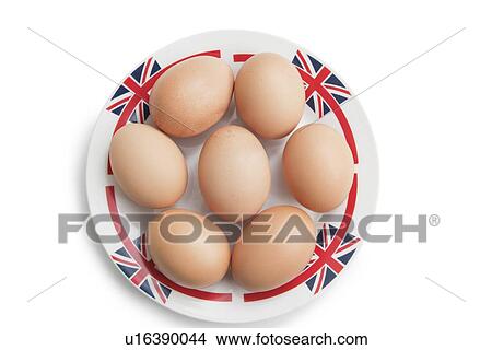 Brown eggs in plate over white background View Large Photo Image Picture - Brown eggs in plate over white background. Fotosearch