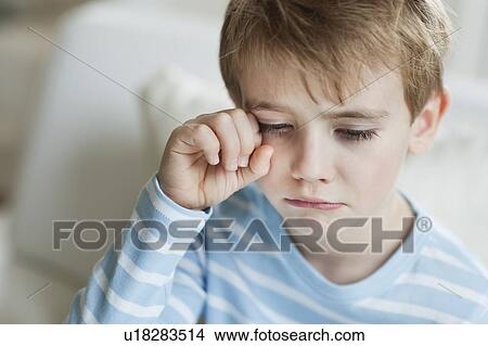 Close-up of a cute little boy crying View Large Photo Image Picture - Close-up of a cute little boy crying. Fotosearch