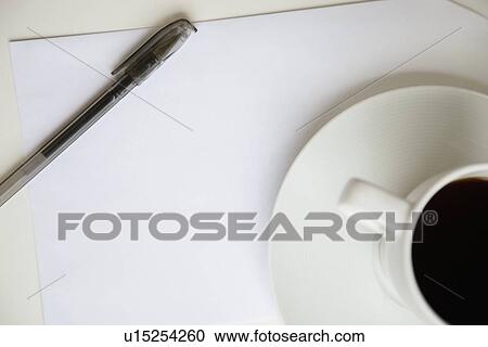 Cropped image of coffee cup with pen on a blank paper View Large Photo Image Stock Image - Cropped image of coffee cup with pen on a blank paper. Fotosearch