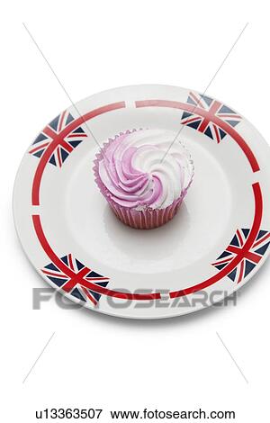 Delicious raspberry cupcake in plate over white background View Large Photo Image Stock Photo - Delicious raspberry cupcake in plate over white background. Fotosearch