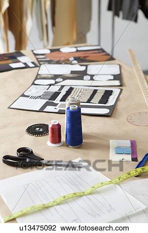 Fashion designing materials on table in design studio View Large Photo Image Stock Image - Fashion designing materials on table in design studio. Fotosearch
