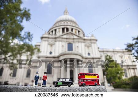 Figurines of London officers and public transports with St. Paul's Cathedral in background View Large Photo Image Stock Photograph - Figurines of London officers and public transports with St. Paul's Cathedral in background. Fotosearch