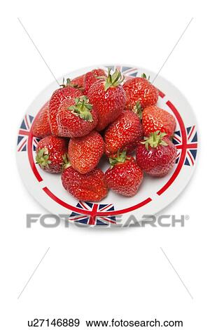 Stock Photo - Fresh strawberries in plate over white background. Fotosearch