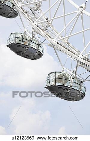 Stock Photo - London Eye against sky, London, England, UK. Fotosearch