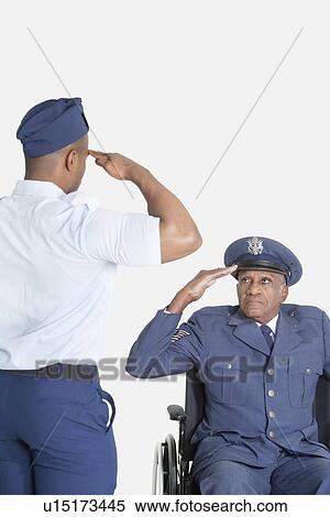 Male cadet saluting senior air force office in wheelchair over light gray background View Large Photo Image Stock Photography - Male cadet saluting senior air force office in wheelchair over light gray background. Fotosearch