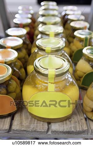 Olive oil and clarified butter preserved in jars View Large Photo Image Stock Photo - Olive oil and clarified butter preserved in jars. Fotosearch