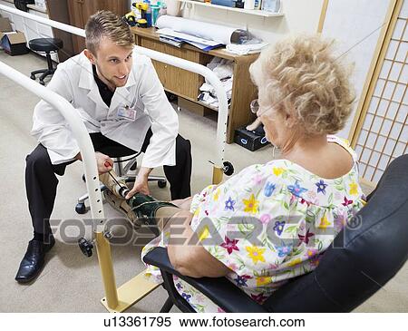 Patient being fitted with a prosthetic leg View Large Photo Image Stock Photography - Patient being fitted with a prosthetic leg. Fotosearch