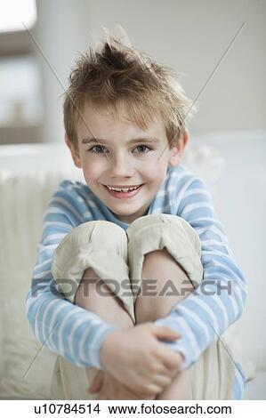 Picture - Portrait of a happy young boy smiling. Fotosearch