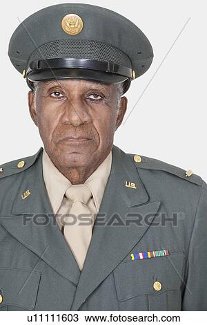 Portrait of a senior male US military officer over gray background View Large Photo Image Stock Image - Portrait of a senior male US military officer over gray background. Fotosearch