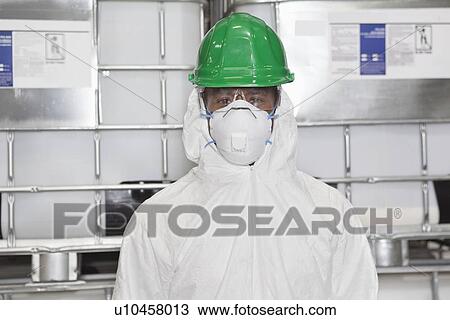 Portrait of male technician in hazmat suit View Large Photo Image Stock Image - Portrait of male technician in hazmat suit. Fotosearch