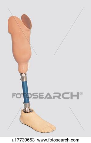 Stock Image - Prosthetic leg over grey background. Fotosearch