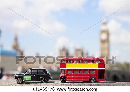 Public transport figurines with Big Ben Tower in the background View Large Photo Image Stock Photograph - Public transport figurines with Big Ben Tower in the background. Fotosearch