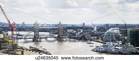 Tower Bridge over River Thames and cityscape, London, England, UK View Large Photo Image Stock Photography - Tower Bridge over River Thames and cityscape, London, England, UK. Fotosearch