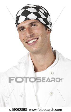 Close-up portrait of young chef smiling and looking off camera View Large Photo Image Stock Photo - Close-up portrait of young chef smiling and looking off camera. Fotosearch