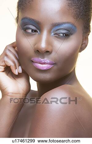 Stock Photo - Close-up view of beautiful woman wearing make-up. Fotosearch