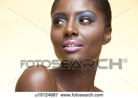 Close-up view of beautiful woman wearing make-up View Large Photo Image Stock Photo - Close-up view of beautiful woman wearing make-up. Fotosearch