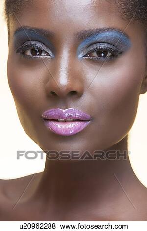 Stock Photo - Close-up view of beautiful woman wearing make-up. Fotosearch