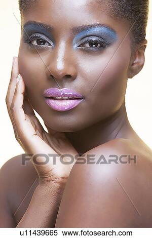 Close-up view of beautiful woman wearing make-up View Large Photo Image Stock Photography - Close-up view of beautiful woman wearing make-up. Fotosearch