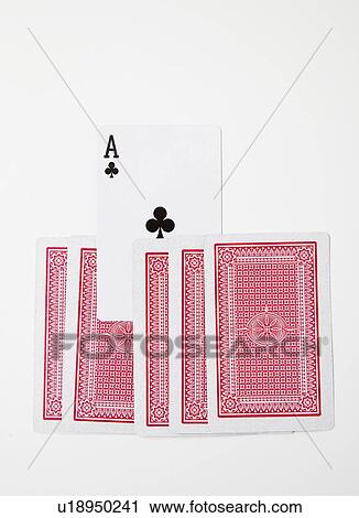 Stock Image - Deck of playing cards with ace card revealed against white background. Fotosearch