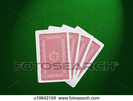 Four playing cards over green background View Large Photo Image Stock Photo - Four playing cards over green background. Fotosearch